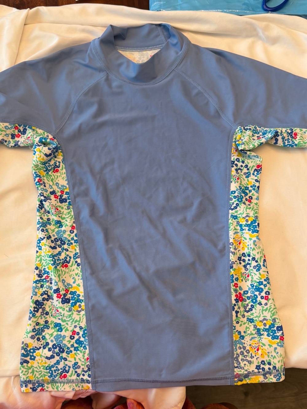 Patagonia Light Blue Girls' Short Sleeve Swim Top with Floral Lining